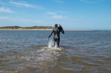 Wading across Overy Cockle Strand